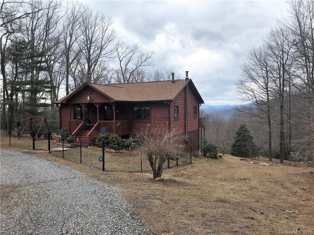 707 Phillips Gap Road Purlear, NC 28665 - Photo 4 of 27 a view of house with a yard
