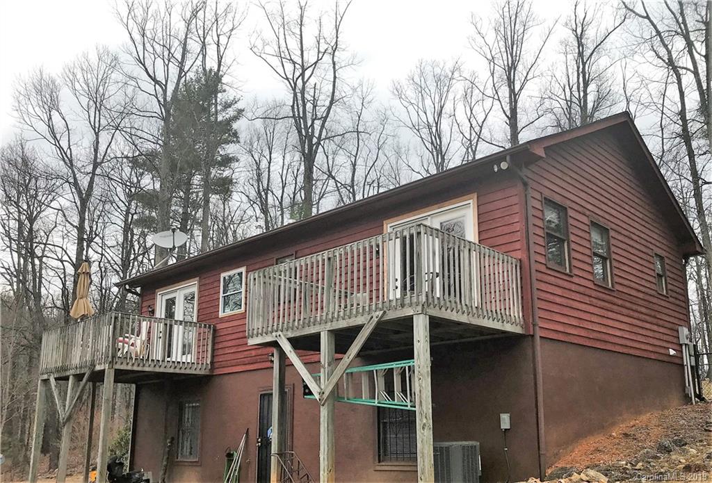 707 Phillips Gap Road Purlear, NC 28665 - Photo 8 of 27 a front view of a house with a yard