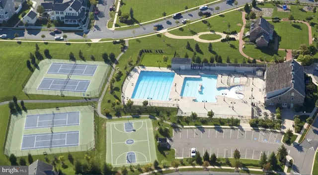 an aerial view of a city with lots of residential buildings
