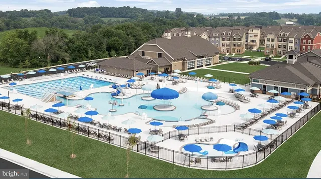 a view of a swimming pool and outdoor space