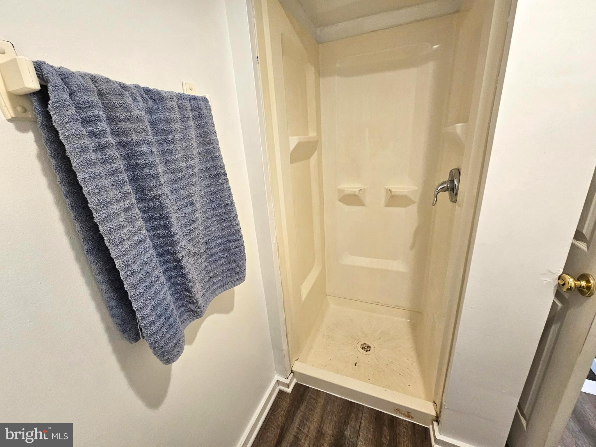 312 Wilkes Street, Unit 2 Berkeley Springs, WV 25411 - Photo 14 of 37 Full bath off kitchen with shower