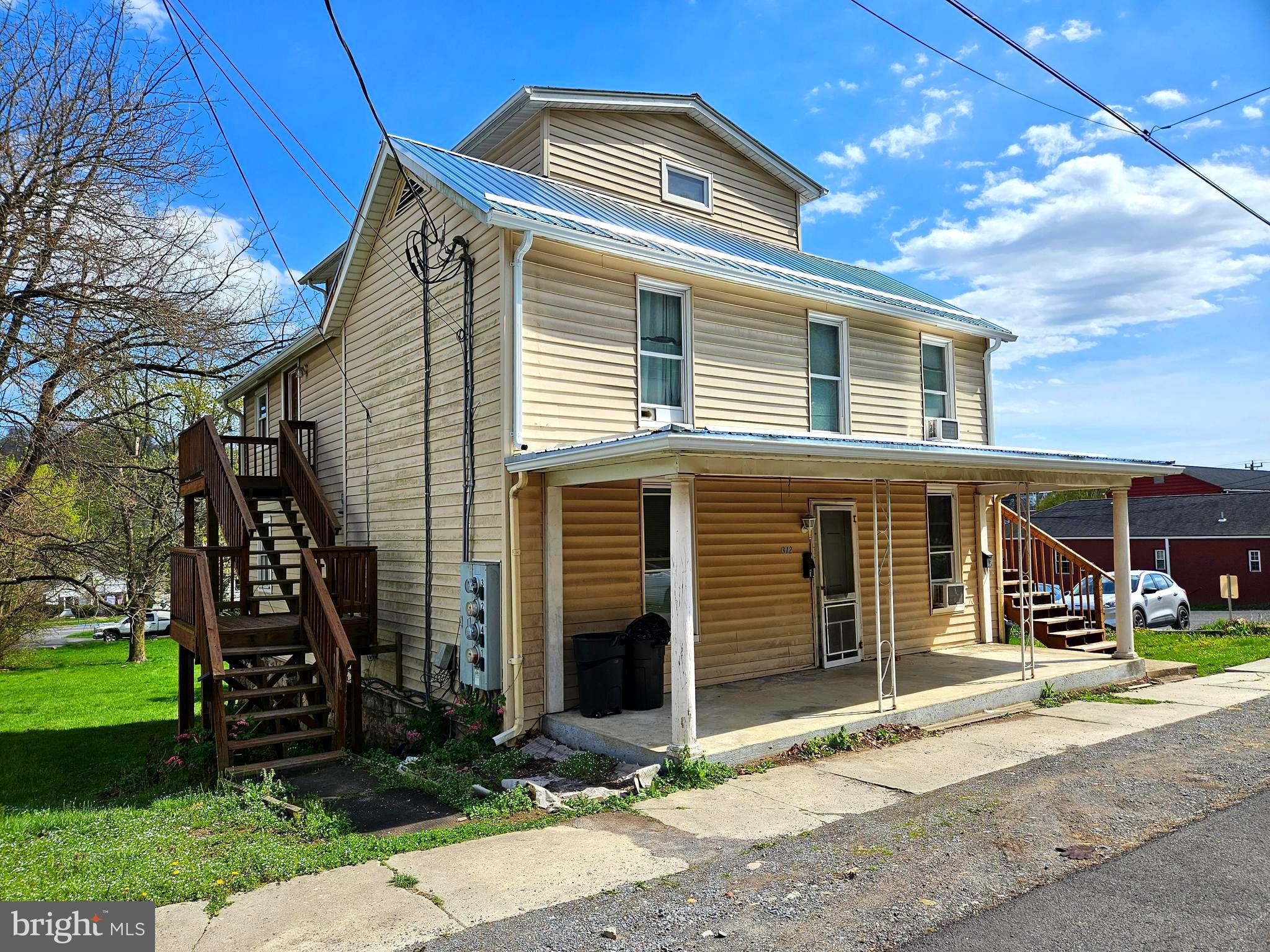 312 Wilkes Street, Unit 2 Berkeley Springs, WV 25411 - Photo 2 of 37 Left side show Apt 2 entrance