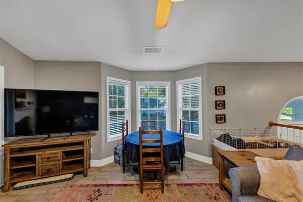 a kitchen with stainless steel appliances a refrigerator sink and stove top oven