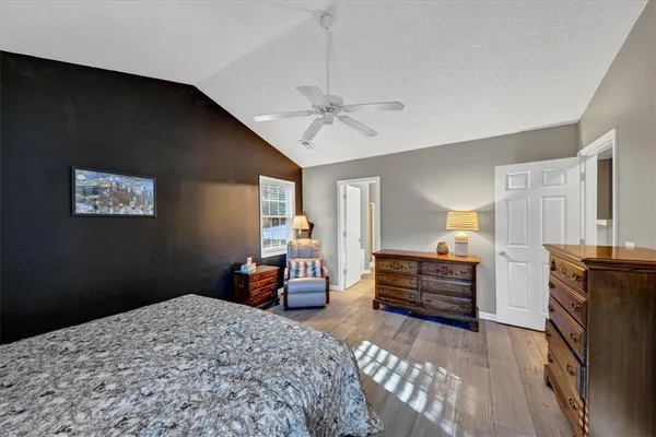 a view of a patio with wooden floor