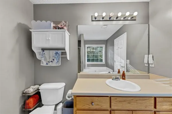 a view of a chairs and table in the patio