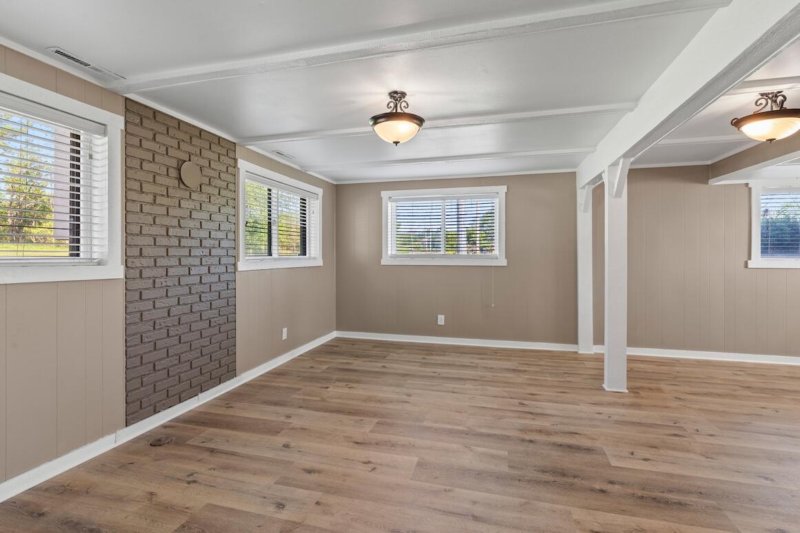 N20W28282 Oakton Road Delafield, WI 53072 - Photo 41 of 49 Lower living/dining