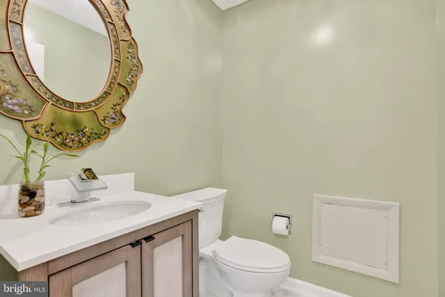 a white bath tub sitting in a bathroom