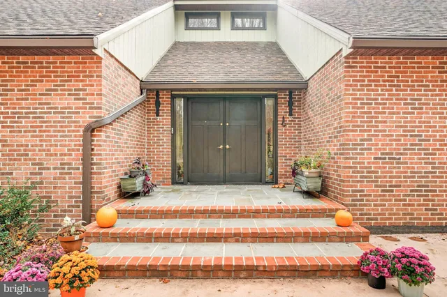 a bed room with furniture and wooden floor