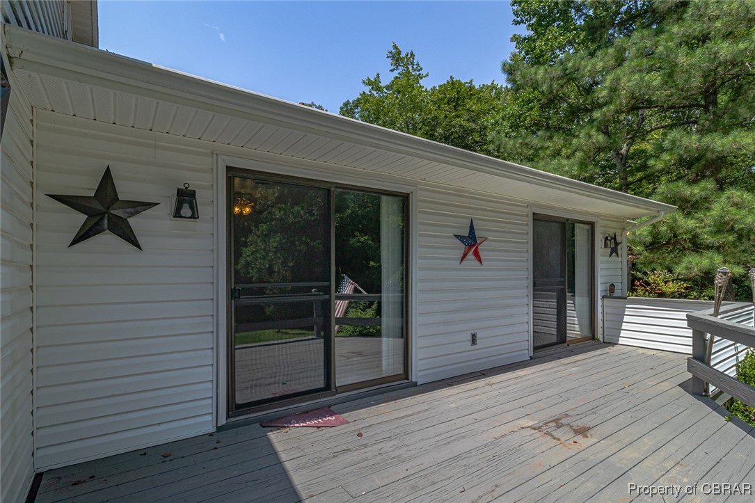 122 Old Glebe Point Road Burgess, VA 22432 - Photo 8 of 50 View of wooden terrace