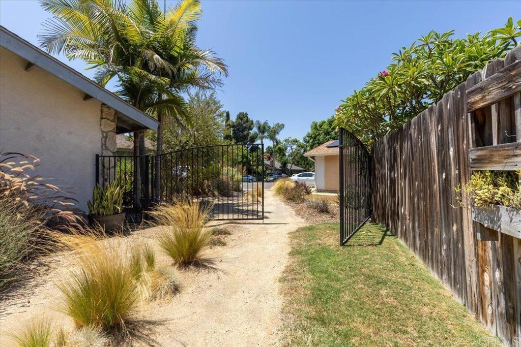 5488 New Mills Road San Diego, CA 92115 - Photo 17 of 17 a view of house with backyard and sitting area