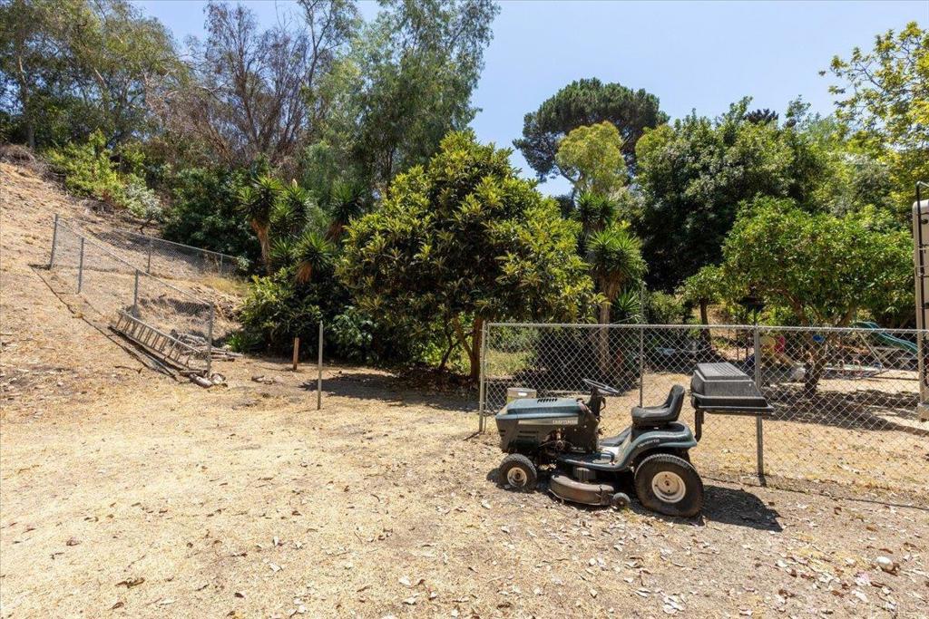 5488 New Mills Road San Diego, CA 92115 - Photo 10 of 17 a view of a backyard with a car and snow