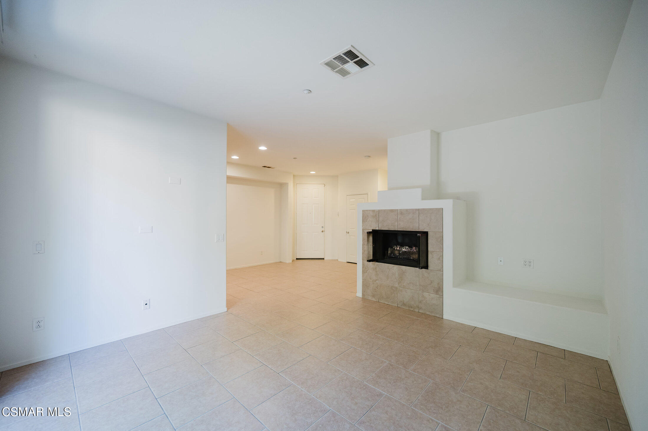 1454 Patricia Avenue, Unit 402 Simi Valley, CA 93065 - Photo 11 of 50 a view of an empty room with a fireplace