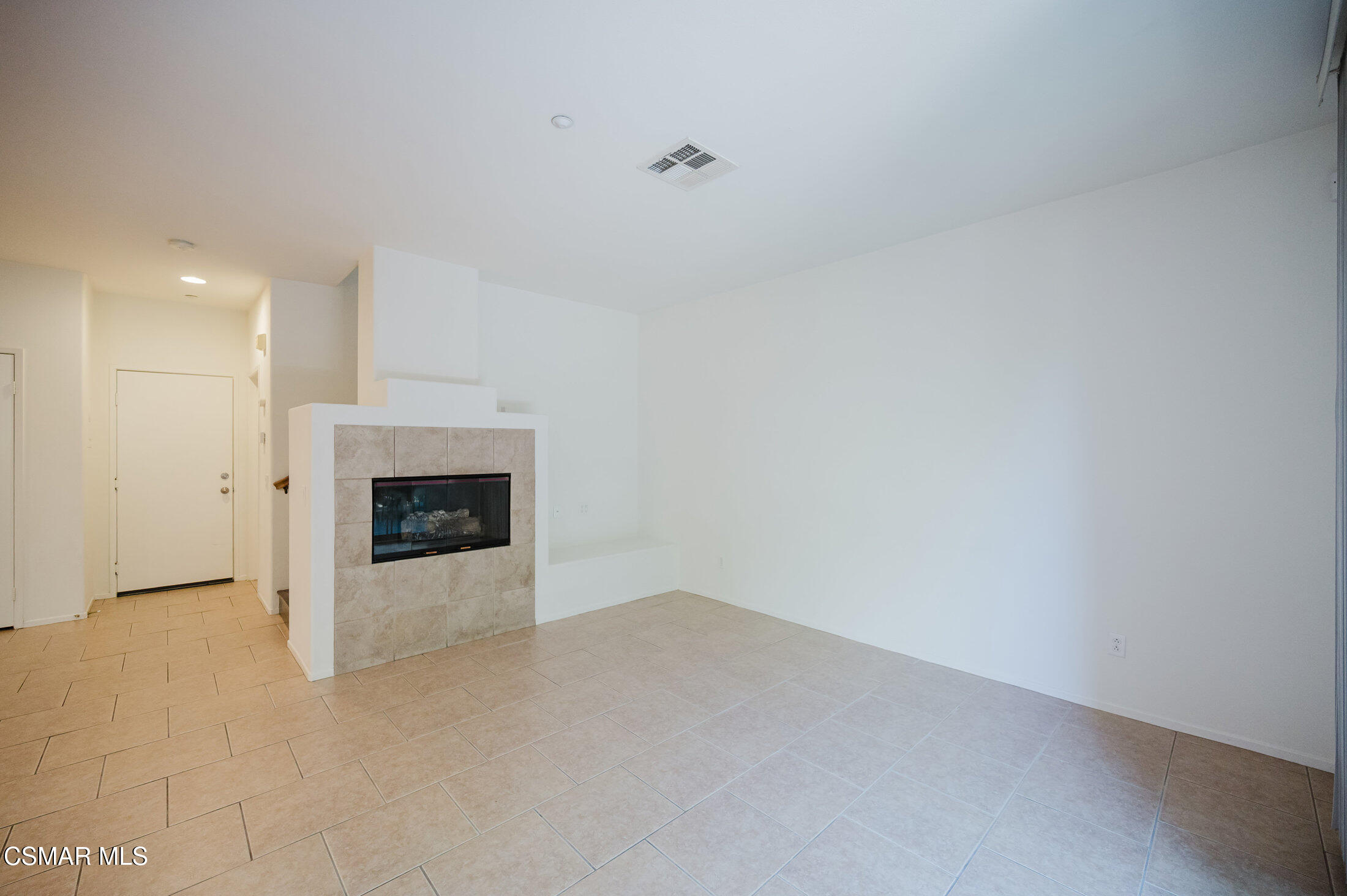1454 Patricia Avenue, Unit 402 Simi Valley, CA 93065 - Photo 10 of 50 a view of an empty room with a fireplace
