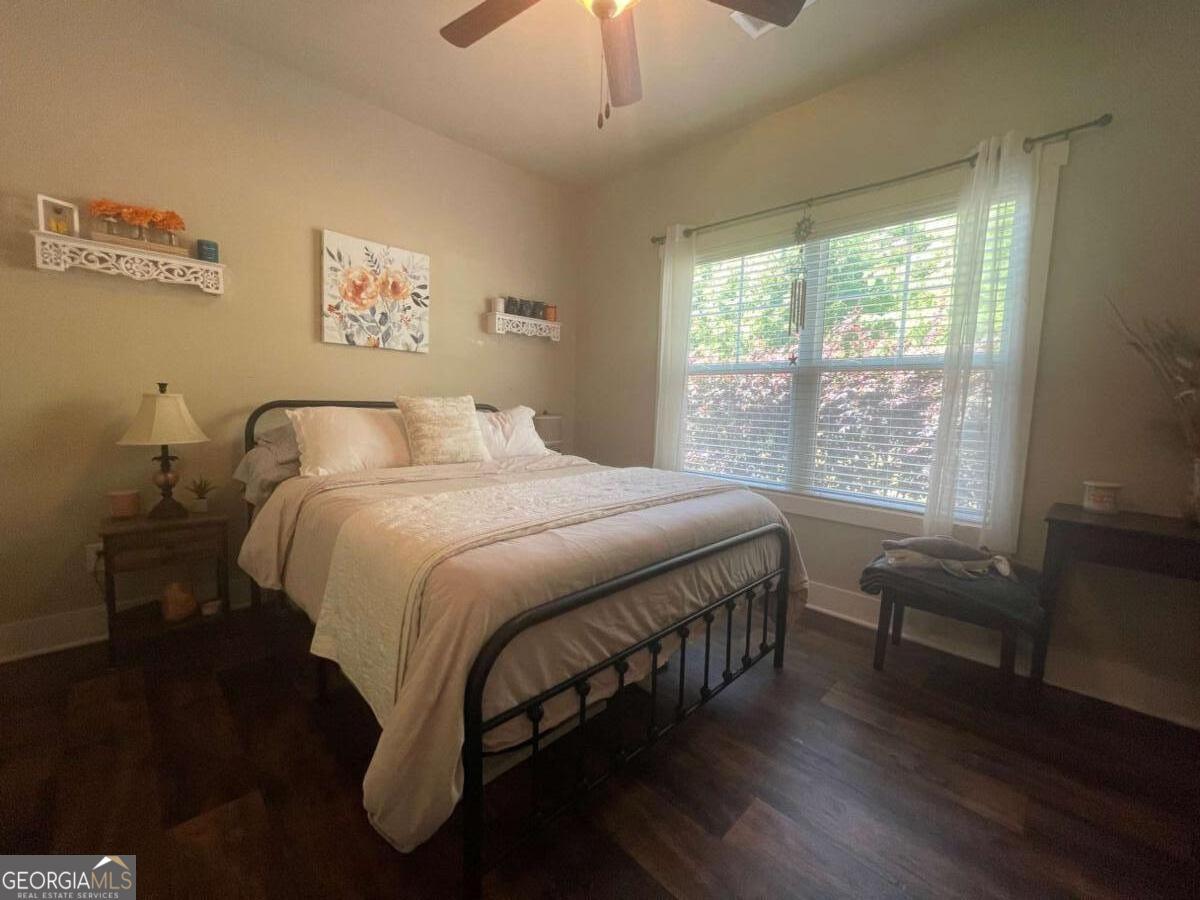 457 Old Good Hope Road Good Hope, GA 30641 - Photo 24 of 59 a bedroom with a large bed and a window
