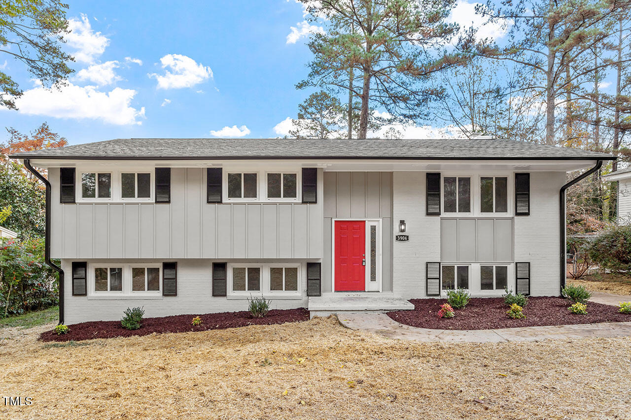 3904 Ingram Drive Raleigh, NC 27604 - Photo 1 of 37 a front view of a house with a yard