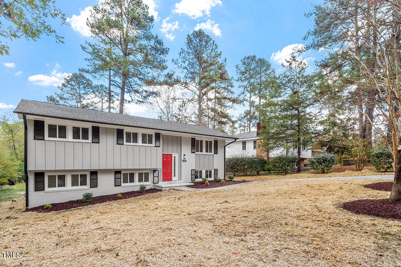 3904 Ingram Drive Raleigh, NC 27604 - Photo 28 of 37 a view of a house with a yard covered in snow