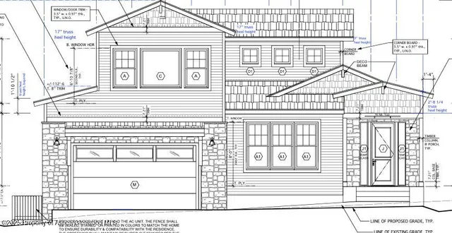 a black and white photo of a house