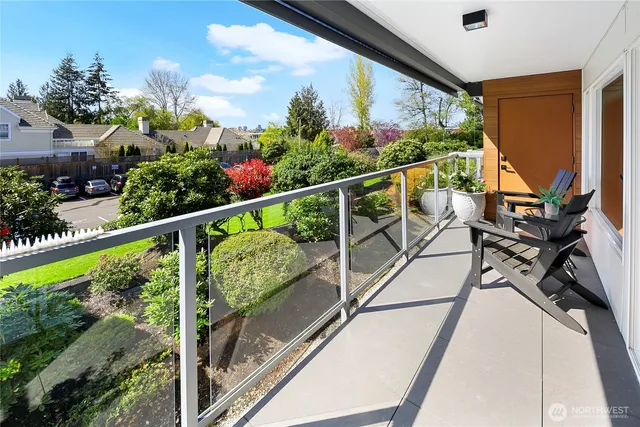 a view of two chairs in balcony