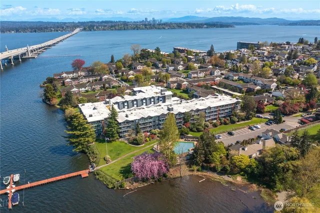an aerial view of a house with a lake view