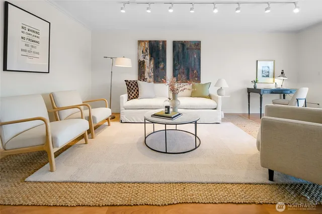 a living room with furniture a rug and a couch