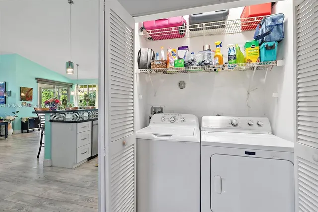 a utility room with dryer and washer