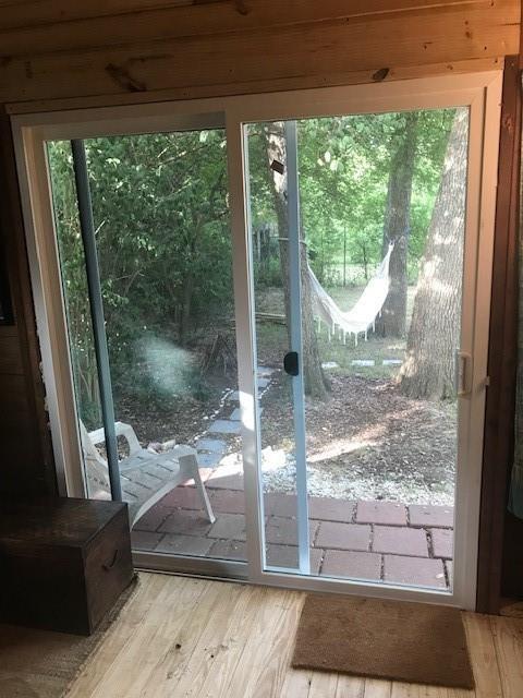 3009 French Place Austin, TX 78722 - Photo 13 of 27 a view of a room with wooden floor and outdoor view