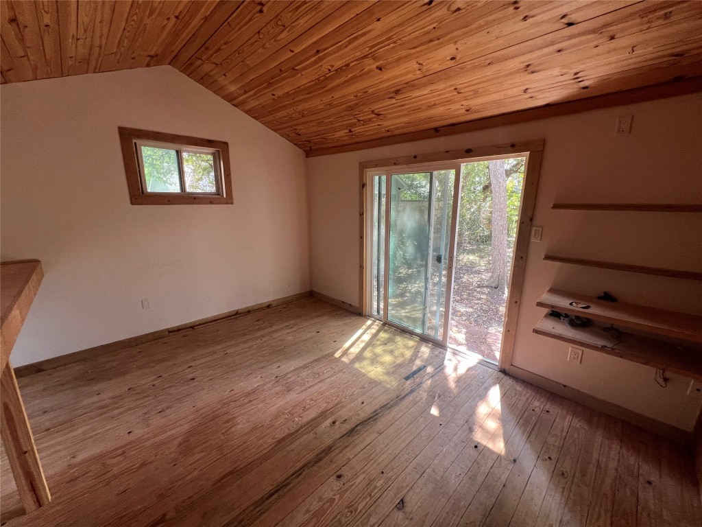 3009 French Place Austin, TX 78722 - Photo 14 of 27 a view of empty room with wooden floor and fan