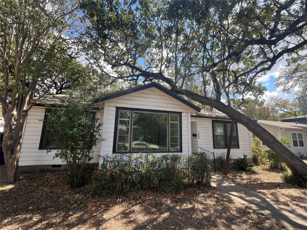 3009 French Place Austin, TX 78722 - Photo 16 of 27 a front view of a house with garden