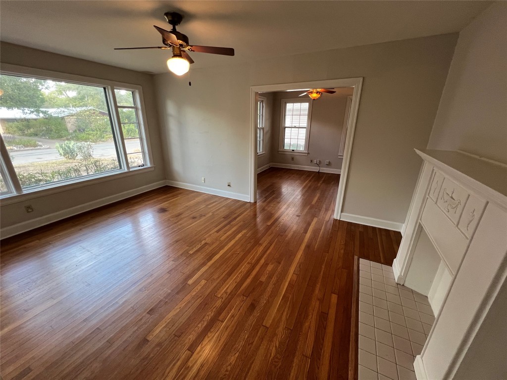 3009 French Place Austin, TX 78722 - Photo 19 of 27 wooden floor in an empty room with a window