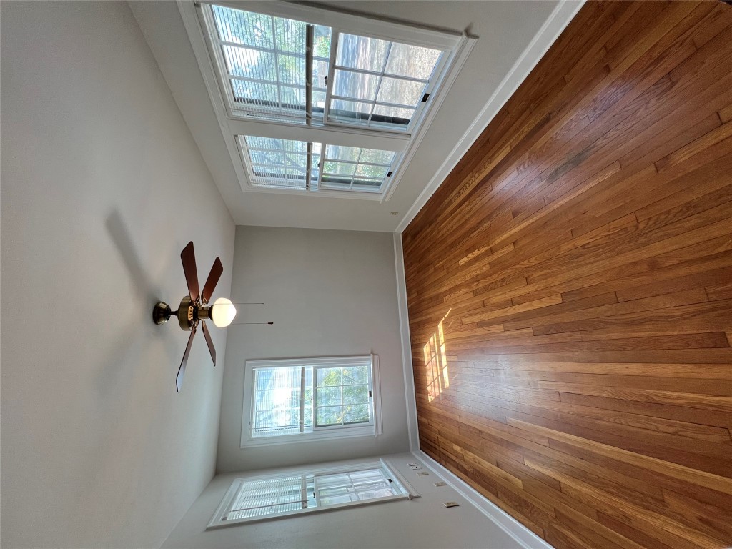3009 French Place Austin, TX 78722 - Photo 27 of 27 wooden floor in an empty room with a window