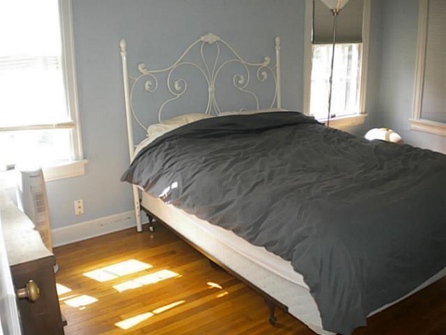 3009 French Place Austin, TX 78722 - Photo 5 of 27 a bedroom with a bed and window