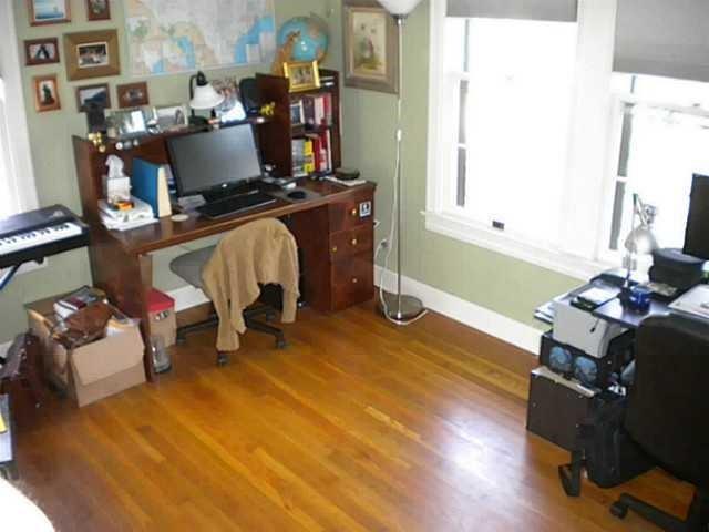 3009 French Place Austin, TX 78722 - Photo 6 of 27 a room with furniture and a window