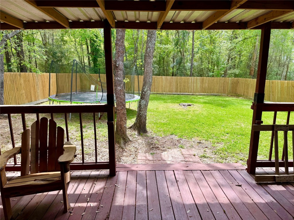 223 Maple Lane Conroe, TX 77304 - Photo 22 of 24 Backyard