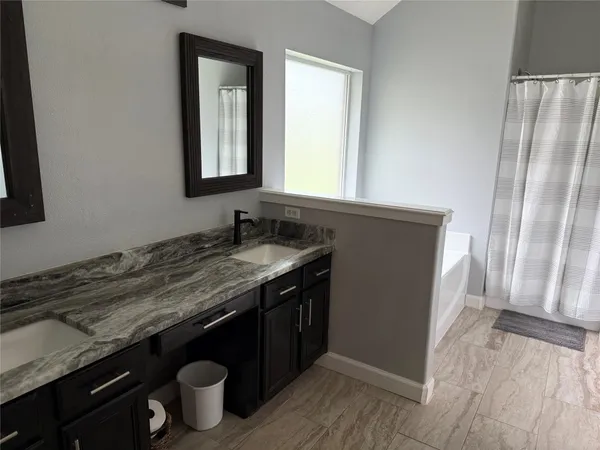 a view of a two chairs in the deck