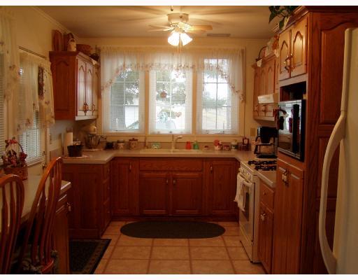 16996 Rte 119 Highway North Rochester Mills, PA 15771 - Photo 4 of 8 Kitchen. Kitchen includes gas stove and refrigerator. Laundry area off kitchen.