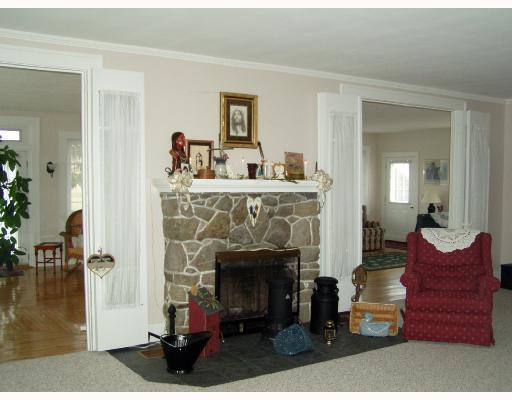 16996 Rte 119 Highway North Rochester Mills, PA 15771 - Photo 7 of 8 Den/Family/Great Room. Family room has double doors into sun room. Stone fireplace in each room. Gas or wood. Plenty of room for family and friends.