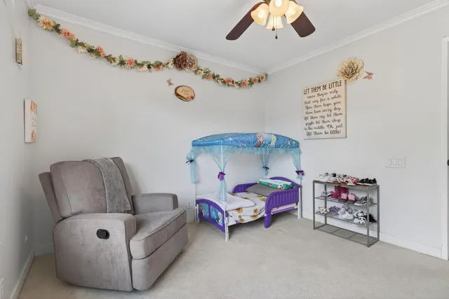 a bedroom with furniture and a couch