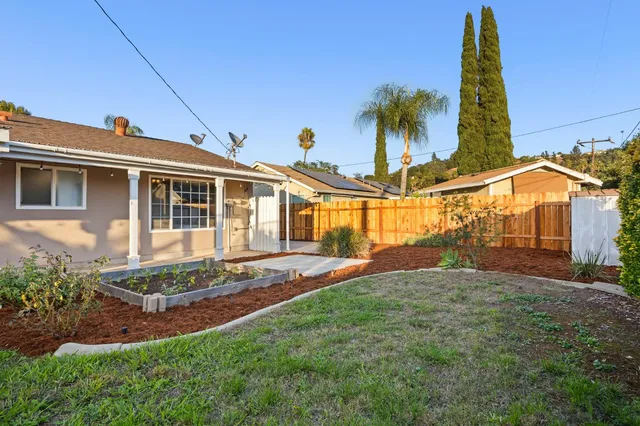 a view of a house with a swimming pool
