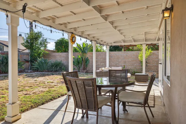 a view of an outdoor space with furniture
