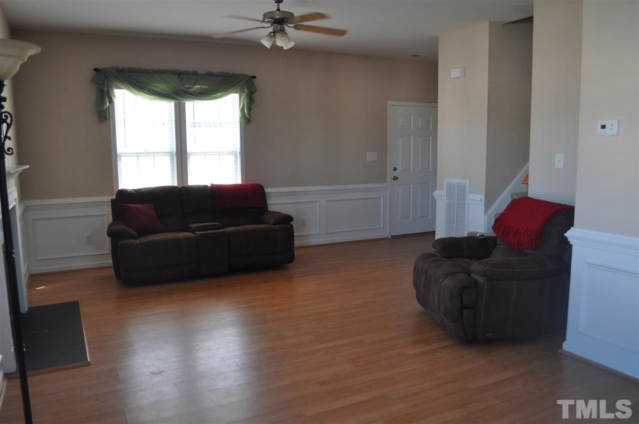 4010 Alder Grove Lane Raleigh, NC 27610 - Photo 3 of 20 Spacious living room with beautiful hardwoods!