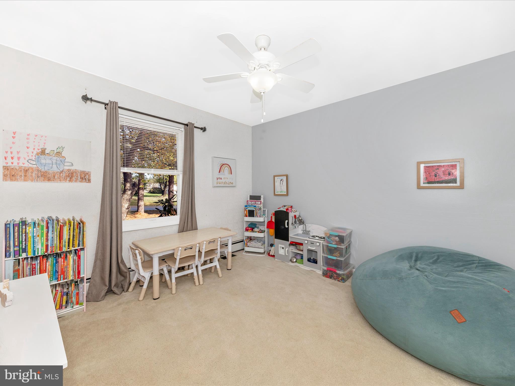 8829 Orndorff Road Thurmont, MD 21788 - Photo 15 of 46 a living room with furniture and a flat screen tv