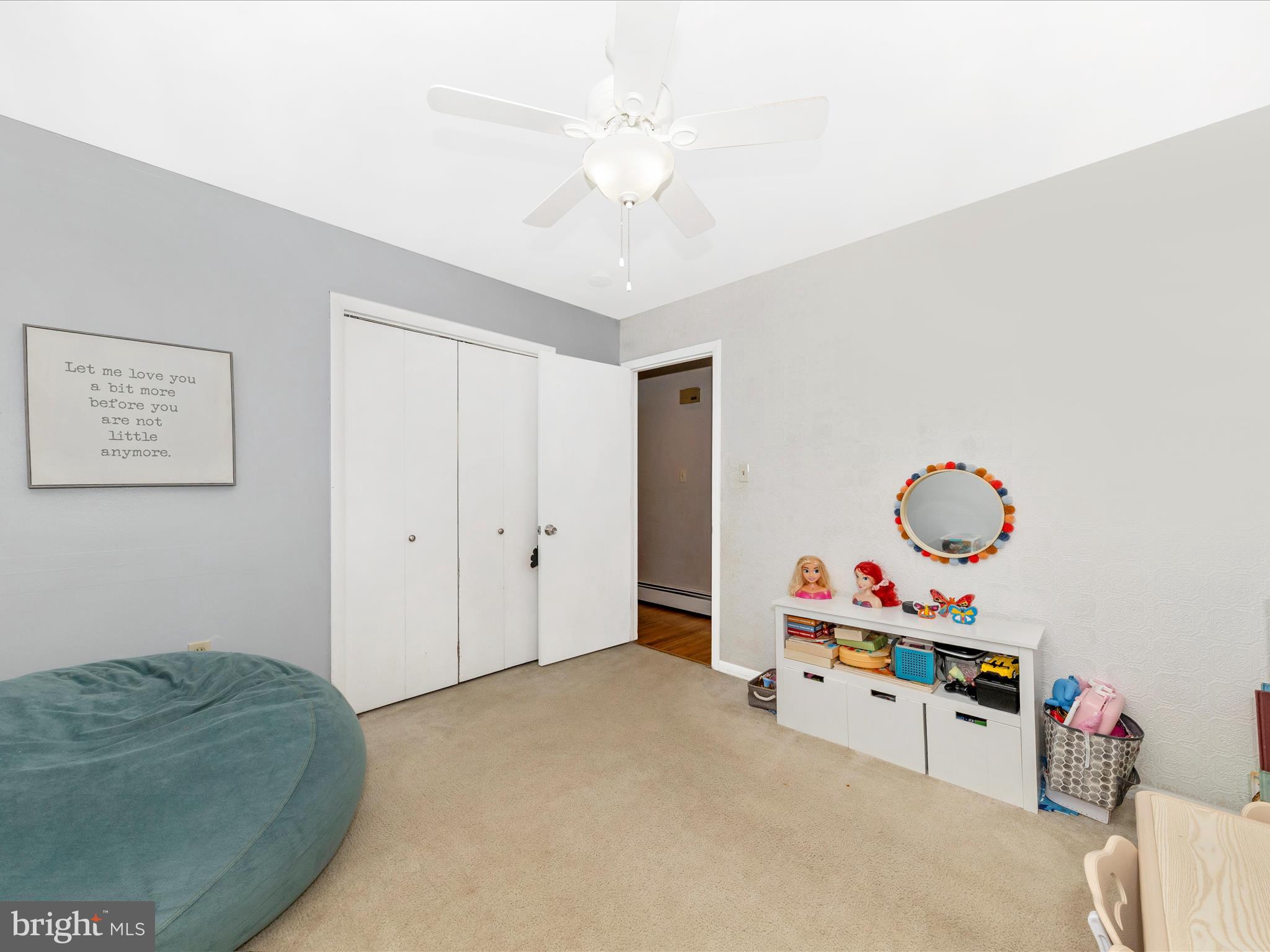 8829 Orndorff Road Thurmont, MD 21788 - Photo 17 of 46 a bedroom with a bed and cabinets