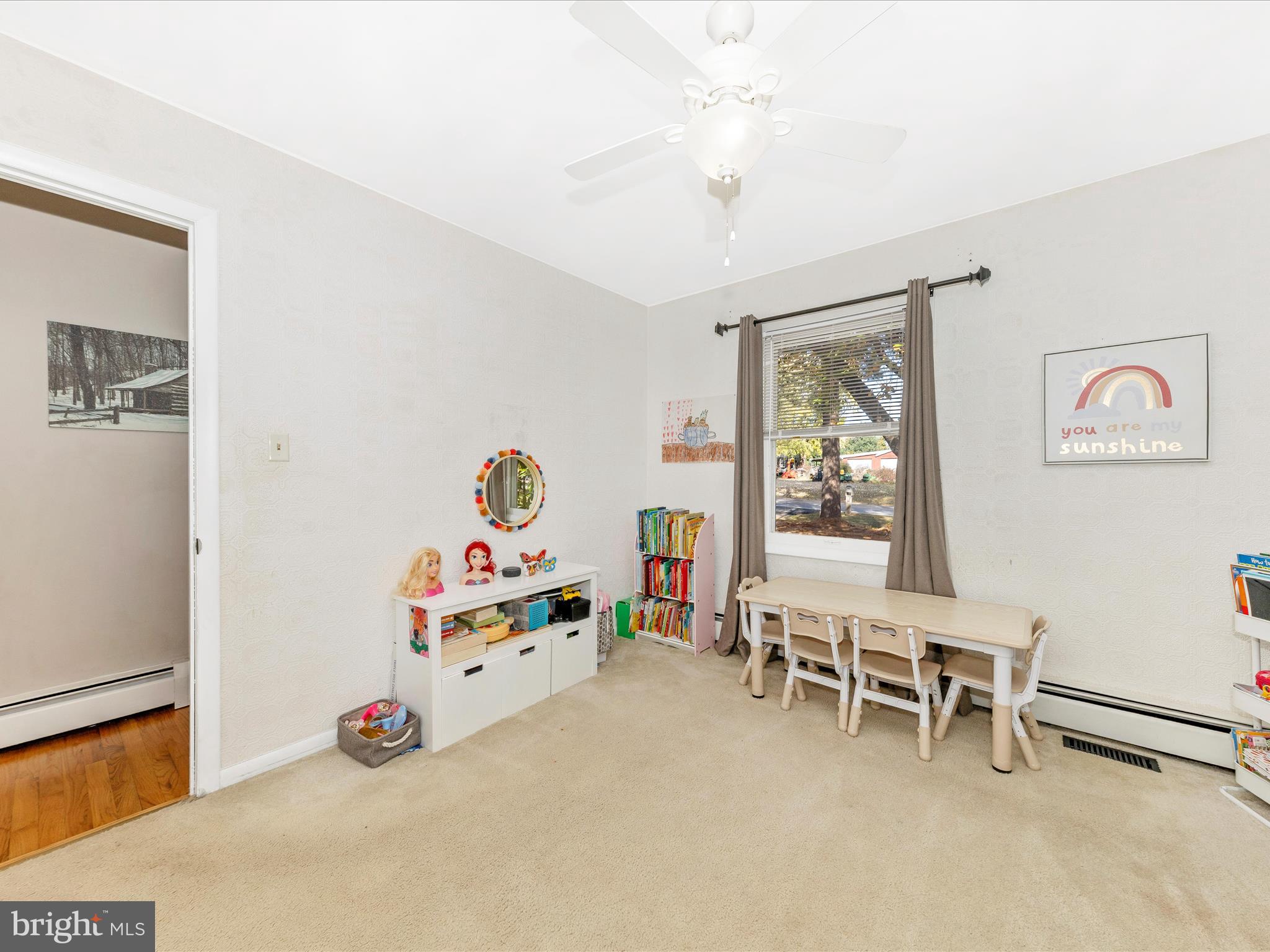 8829 Orndorff Road Thurmont, MD 21788 - Photo 18 of 46 a bedroom with furniture and a window