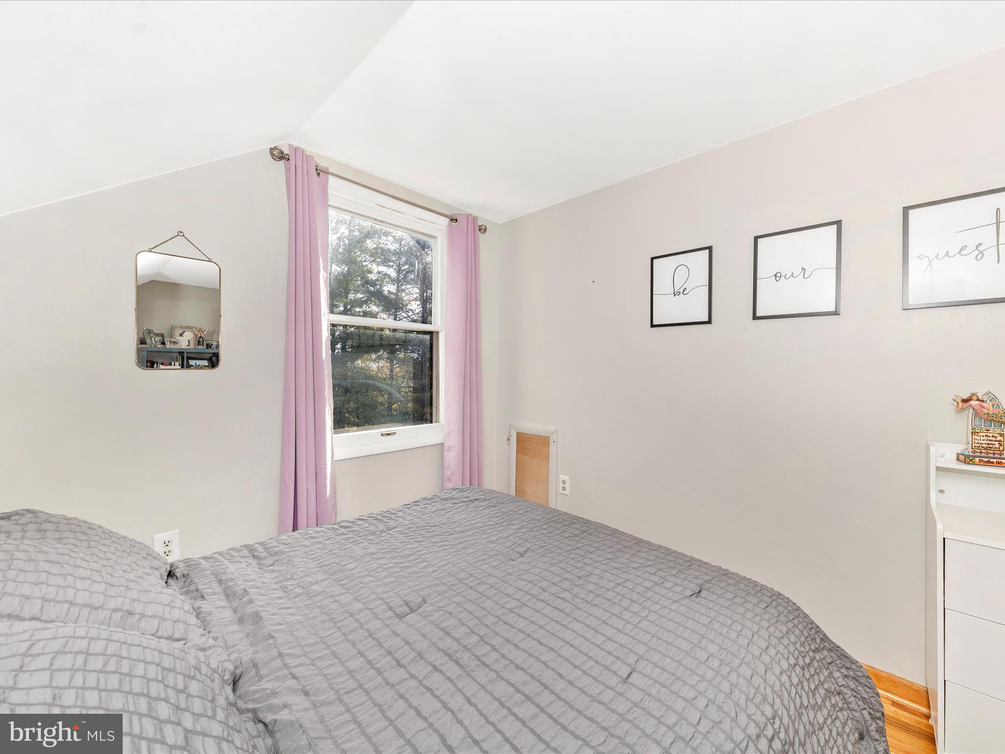 8829 Orndorff Road Thurmont, MD 21788 - Photo 27 of 46 a bedroom with a bed and a window