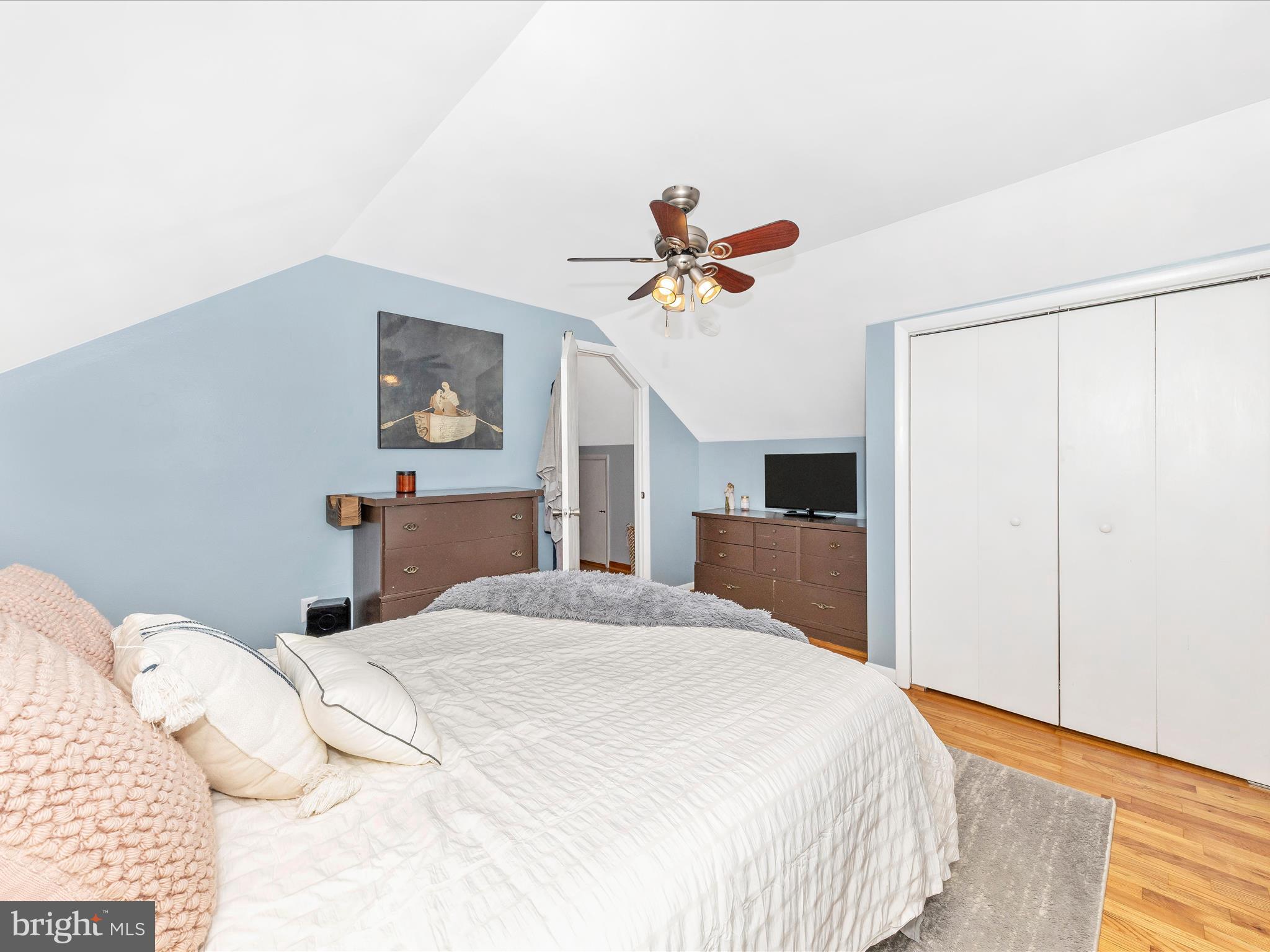 8829 Orndorff Road Thurmont, MD 21788 - Photo 30 of 46 a bedroom with a bed and a chandelier