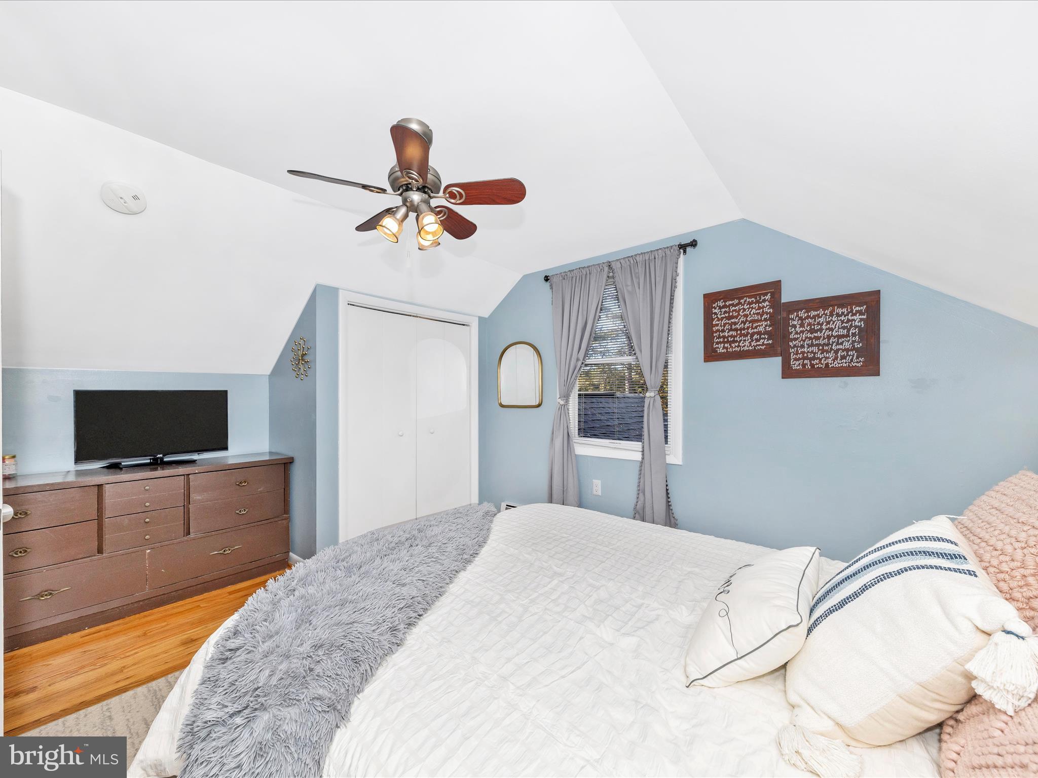 8829 Orndorff Road Thurmont, MD 21788 - Photo 31 of 46 a bedroom with a bed and a flat screen tv