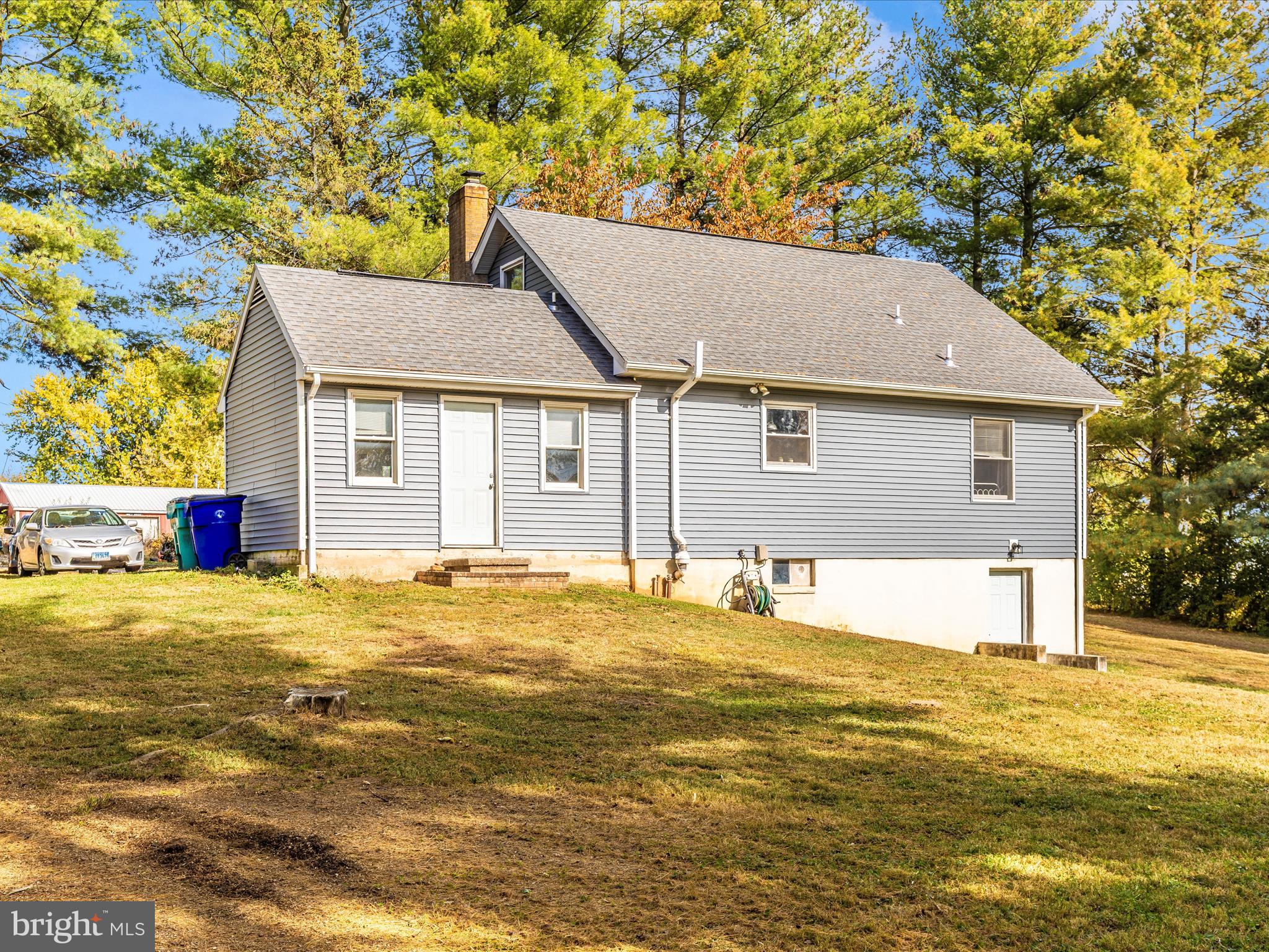 8829 Orndorff Road Thurmont, MD 21788 - Photo 39 of 46 a house that has a swimming pool in front of it