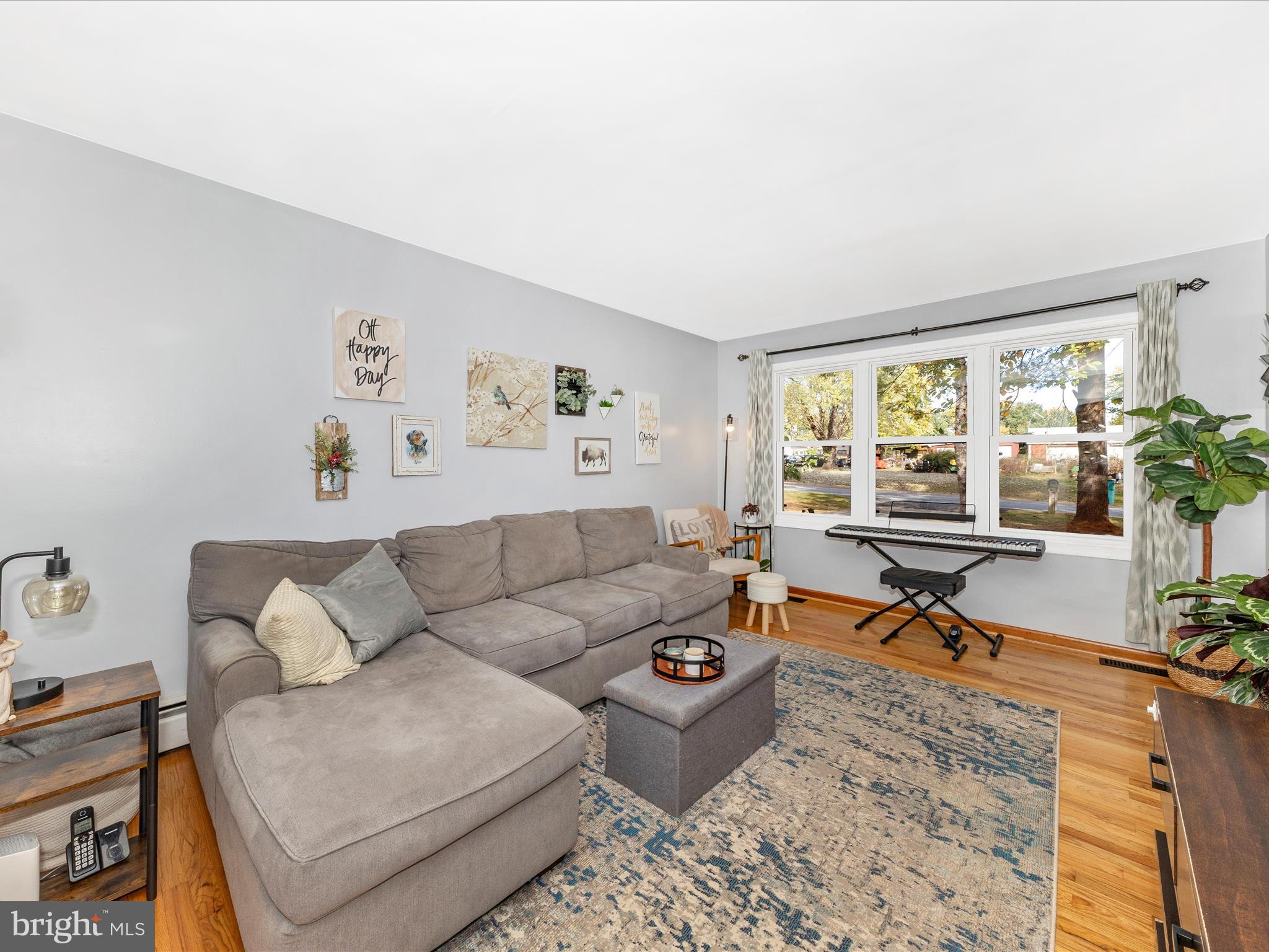 8829 Orndorff Road Thurmont, MD 21788 - Photo 4 of 46 a living room with furniture and a large window