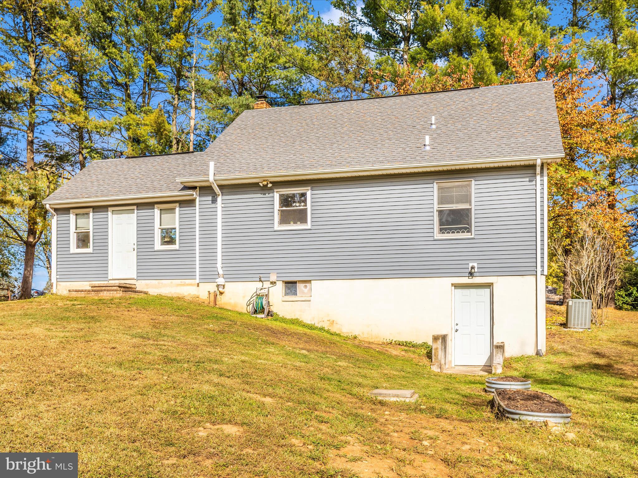 8829 Orndorff Road Thurmont, MD 21788 - Photo 41 of 46 a view of an house with a swimming pool