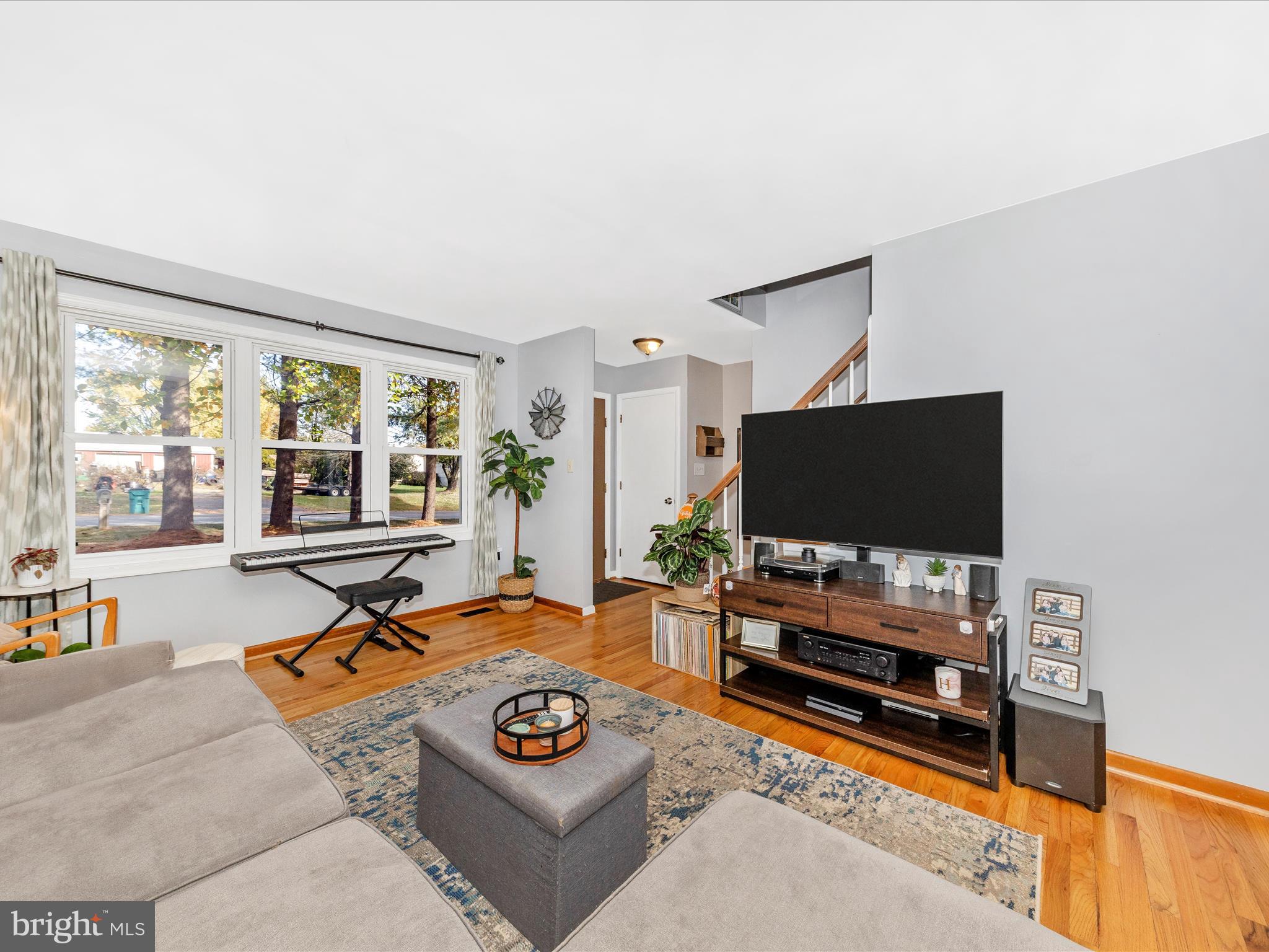 8829 Orndorff Road Thurmont, MD 21788 - Photo 5 of 46 a living room with furniture and a flat screen tv